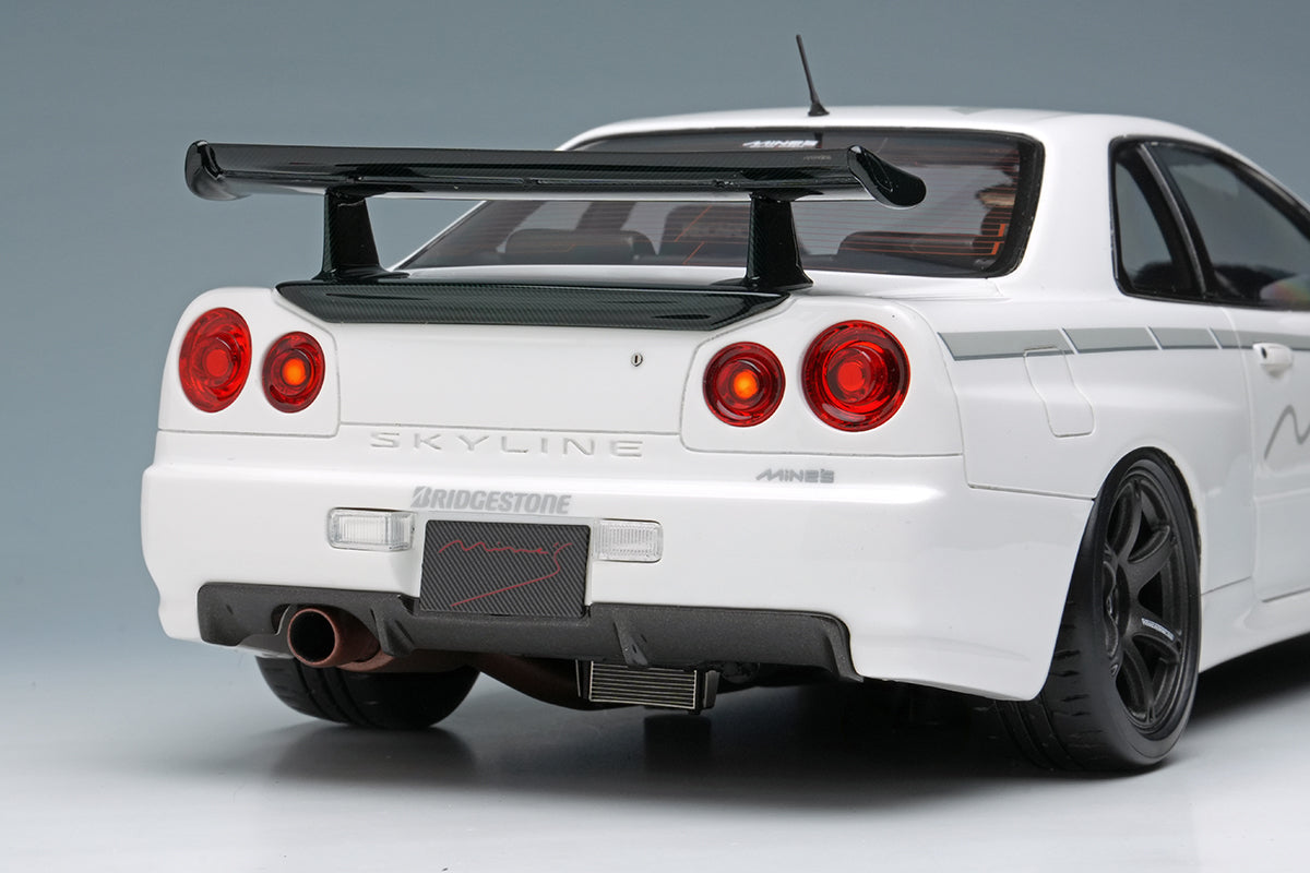 Make Up Co., Ltd / Eidolon Nissan Skyline GT-R (BNR34) V-spec N1 "Mine's" White WITH DISPLAY 1:18