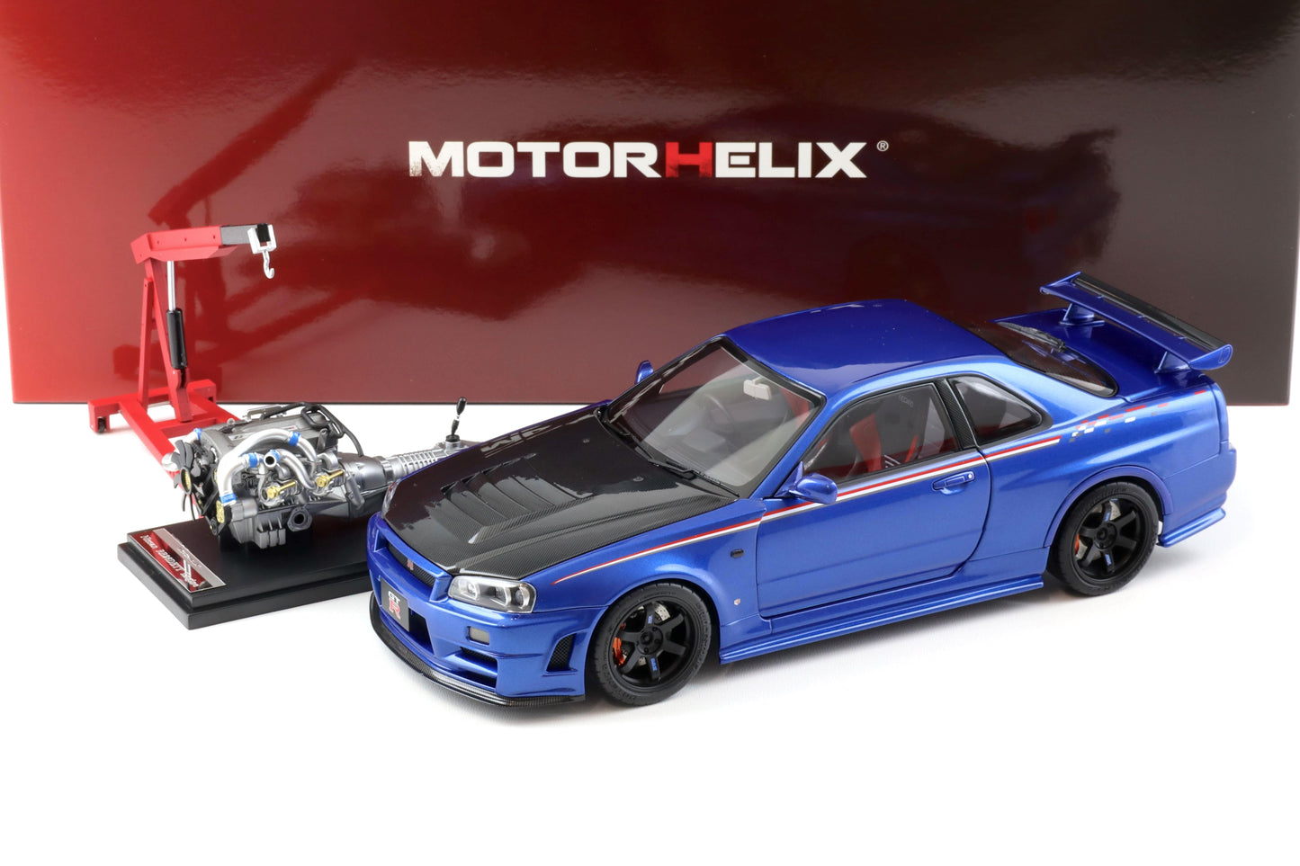 Motorhelix 2002 Nissan Skyline GT-R R34 (BNR34) Nismo CRS RHD Bayside Blue w/ Carbon Hood 1:18