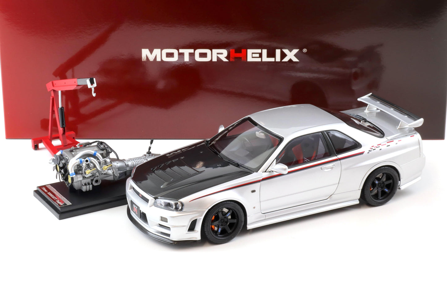 Motorhelix 1999 Nissan Skyline GT-R R34 (BNR34) Nismo CRS RHD Silver w/ Carbon Hood 1:18