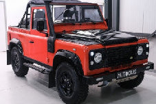 Solido 2016 Land Rover Defender 90 SWB w/ Rear Cover Orange 1:18