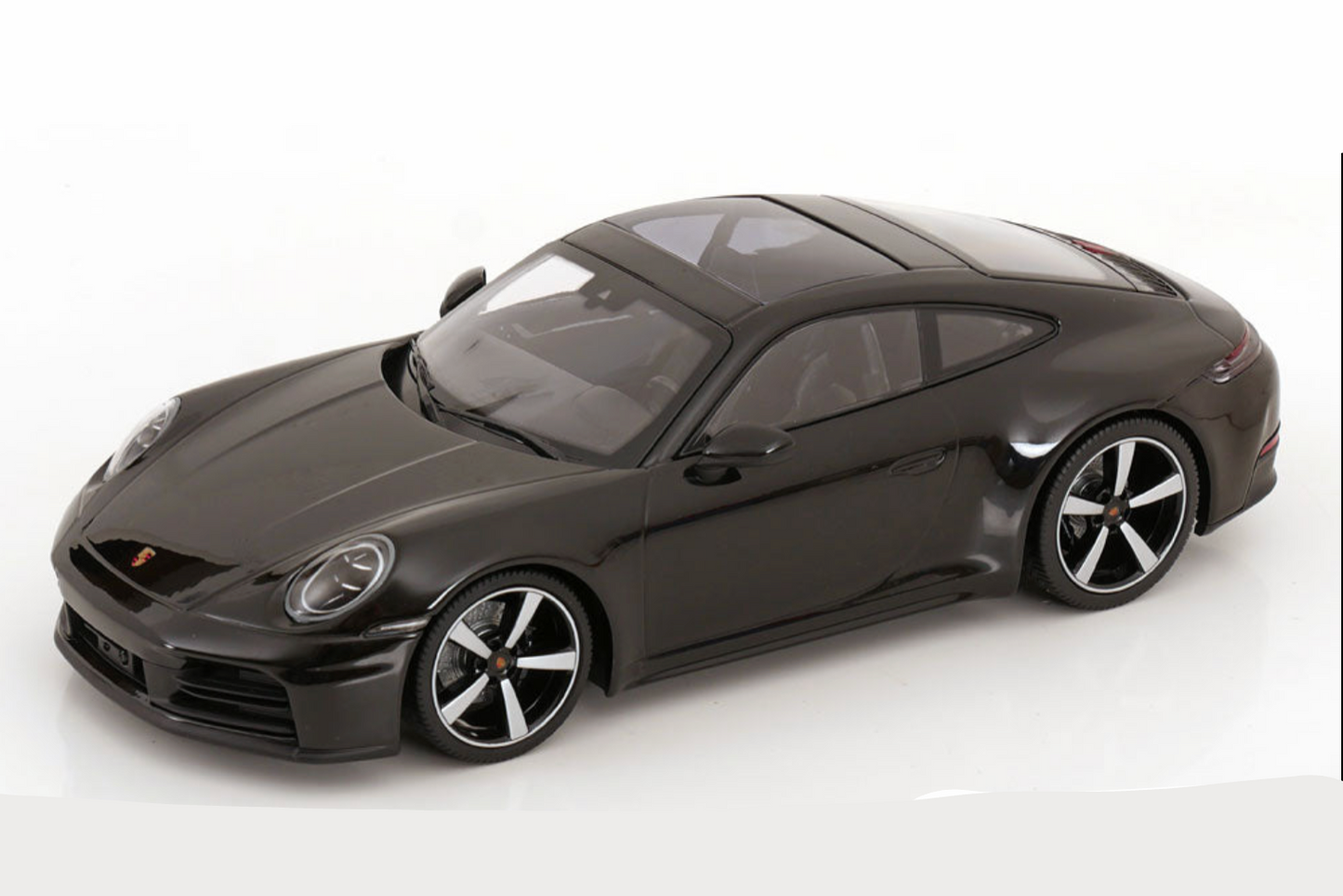 Minichamps 2025 Porsche 911 992.2 Carrera Black Metallic 1:18