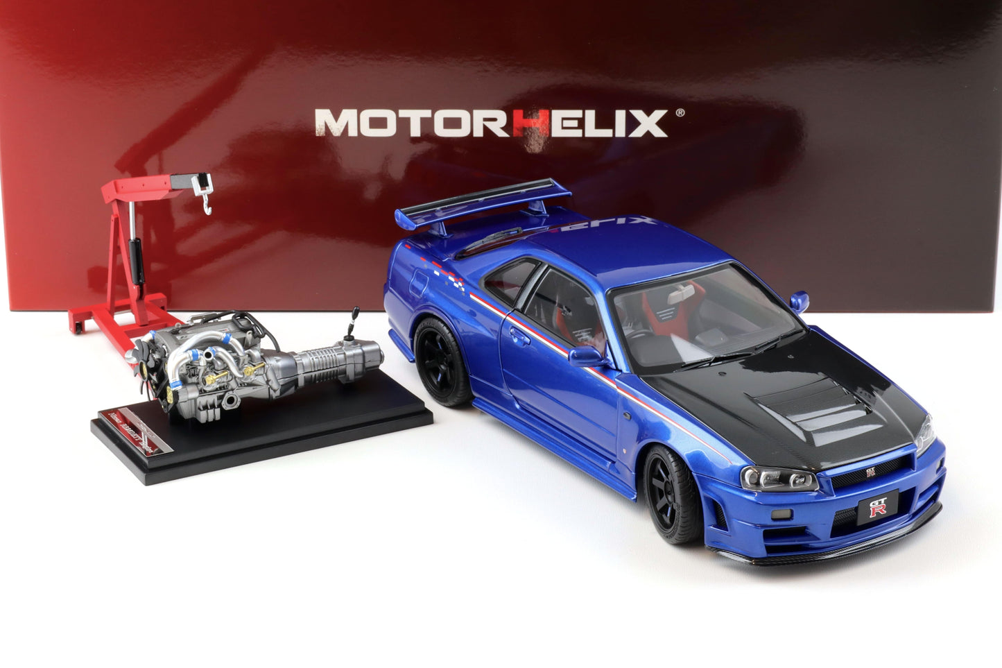 Motorhelix 2002 Nissan Skyline GT-R R34 (BNR34) Nismo CRS RHD Bayside Blue w/ Carbon Hood 1:18
