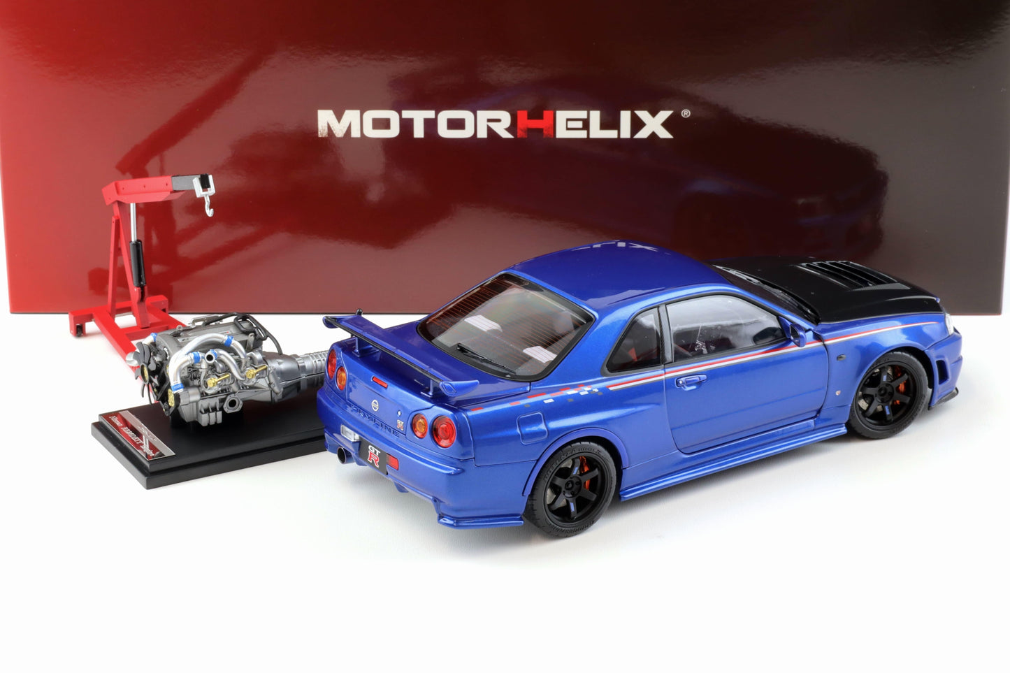 Motorhelix 2002 Nissan Skyline GT-R R34 (BNR34) Nismo CRS RHD Bayside Blue w/ Carbon Hood 1:18