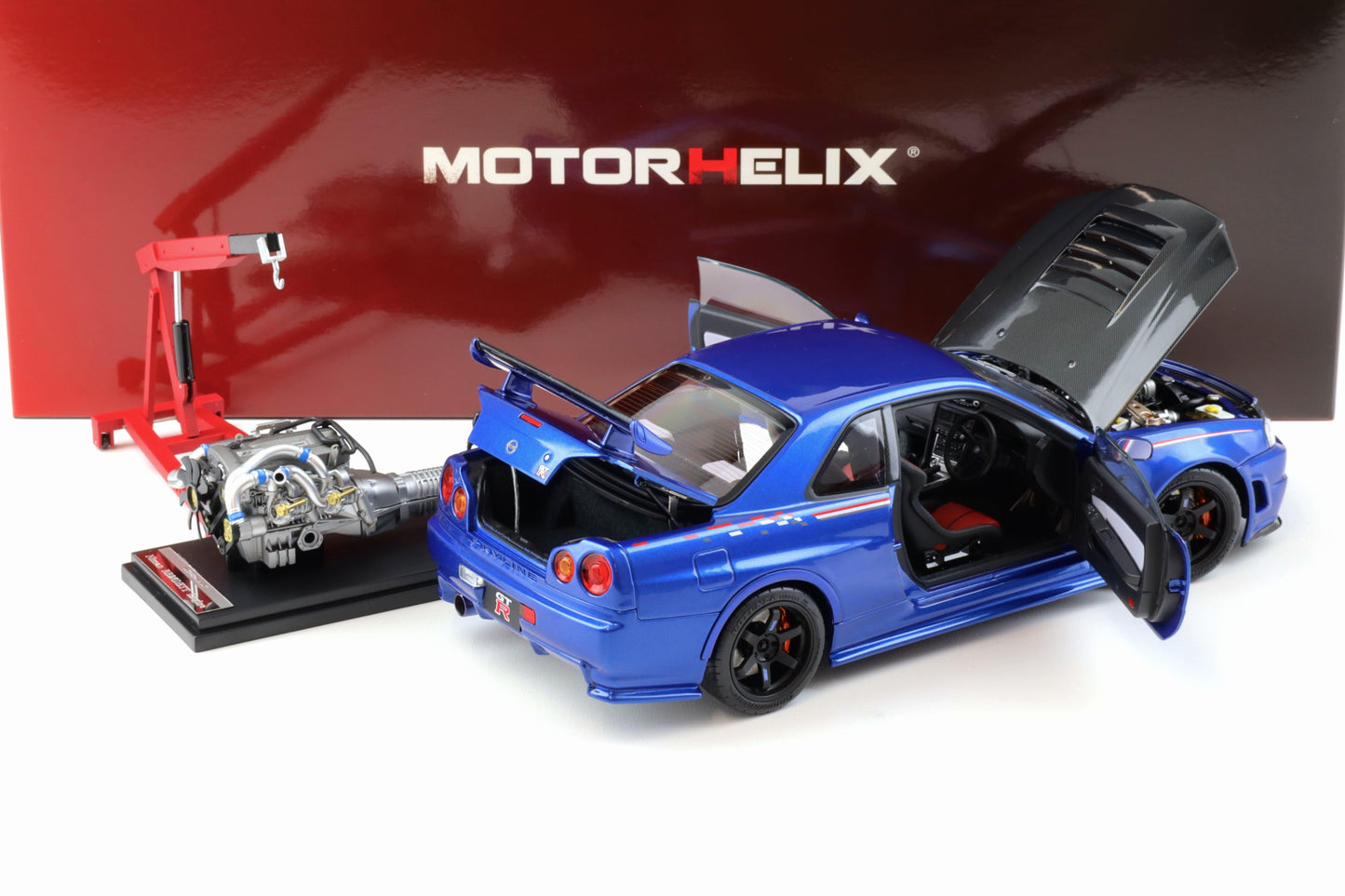 Motorhelix 2002 Nissan Skyline GT-R R34 (BNR34) Nismo CRS RHD Bayside Blue w/ Carbon Hood 1:18