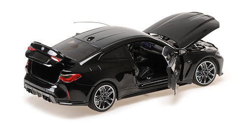 Minichamps 2024 BMW M4 Coupe (G82) w/ Black Carbon Roof Black Metallic 1:18