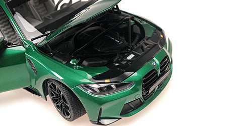 Minichamps 2024 BMW M4 Coupe (G82) w/ Carbon Roof Isle of Man Green Metallic 1:18