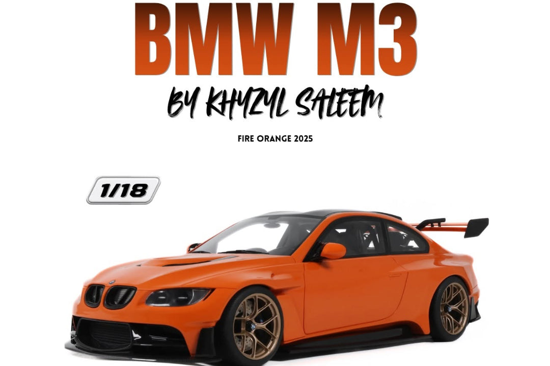 Promotional graphic for a 1/18 scale model car of a BMW M3, featuring an orange car illustration on a white background with 'GT Spirit' branding and 'BMW M3 by Khmyal Saeem' text.