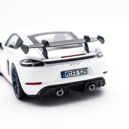 Norev 2023 Porsche 718 Cayman GT4 RS w/ Weissach Package White w/ Blue Wheels 1:18