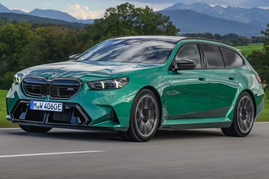 Minichamps 2024 BMW M5 Touring Wagon (G99) Isle of Man Green Metallic 1:18