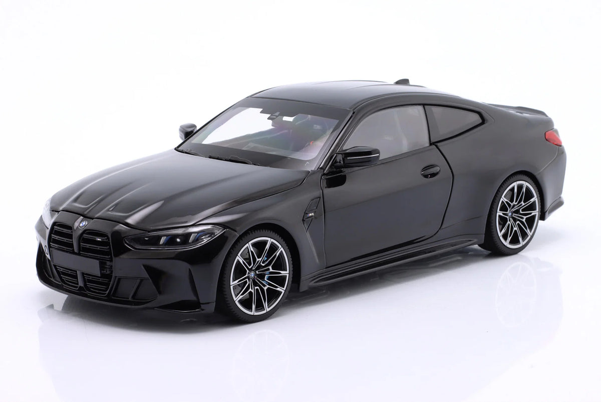 Minichamps 2024 BMW M4 Coupe (G82) w/ Black Carbon Roof Black Metallic 1:18
