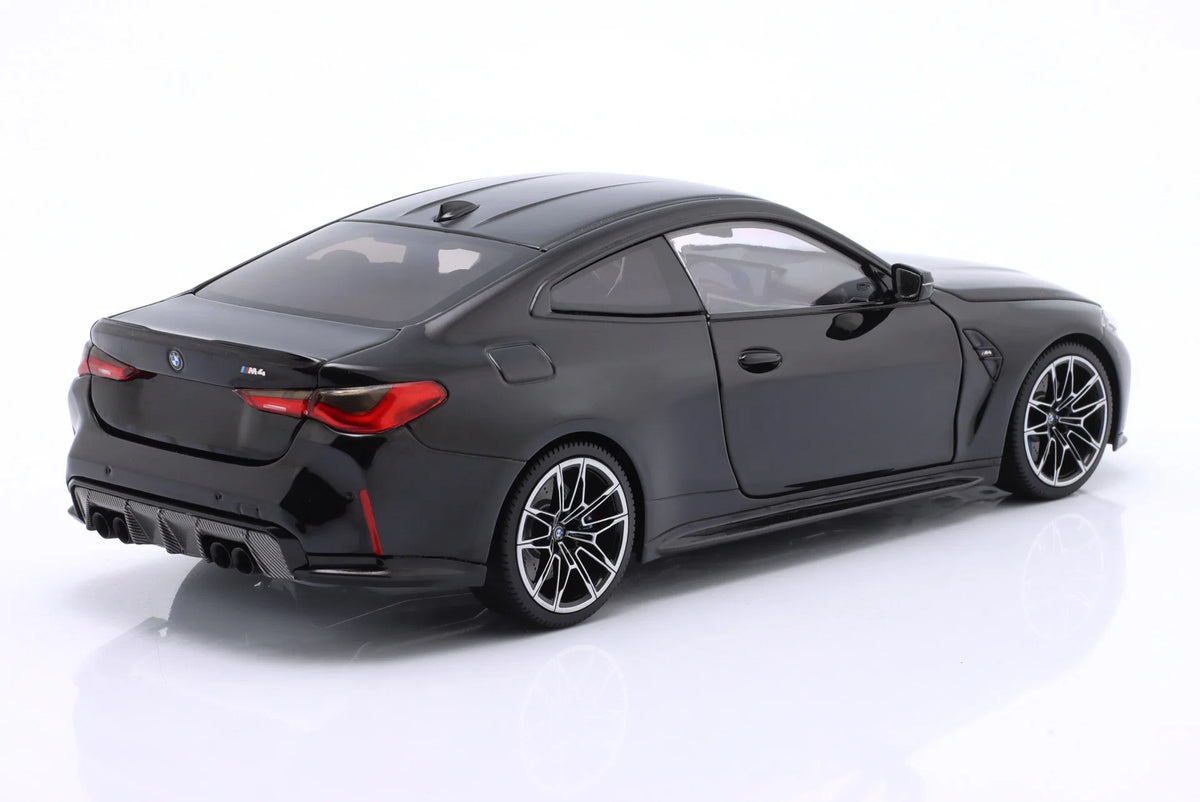 Minichamps 2024 BMW M4 Coupe (G82) w/ Black Carbon Roof Black Metallic 1:18