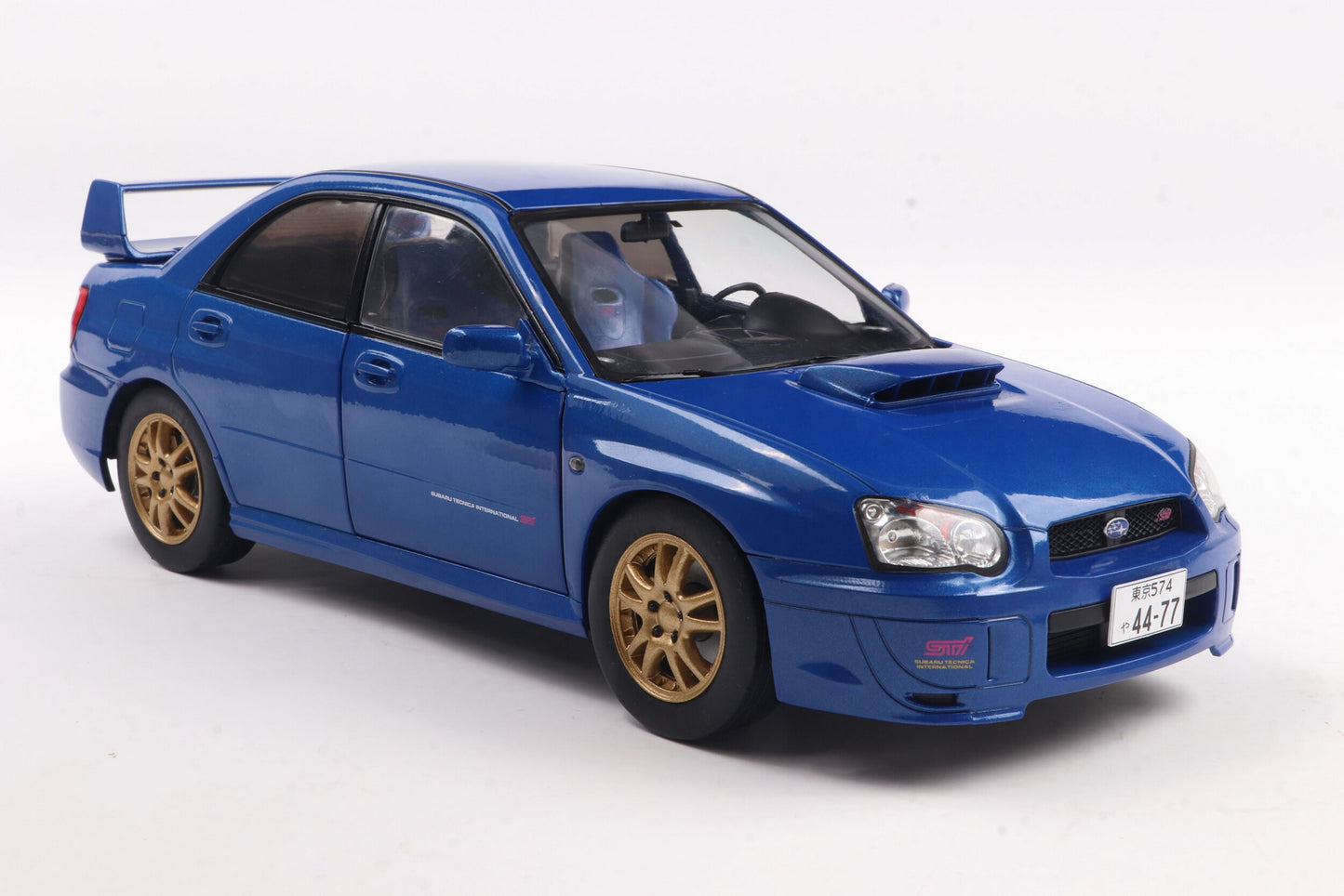 Solido 2003 Subaru WRX STi (GDB) Sonic Blue w/ Gold Wheels 1:18