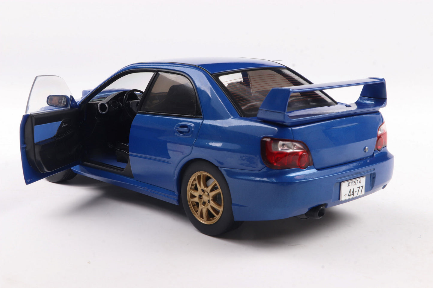 Solido 2003 Subaru WRX STi (GDB) Sonic Blue w/ Gold Wheels 1:18